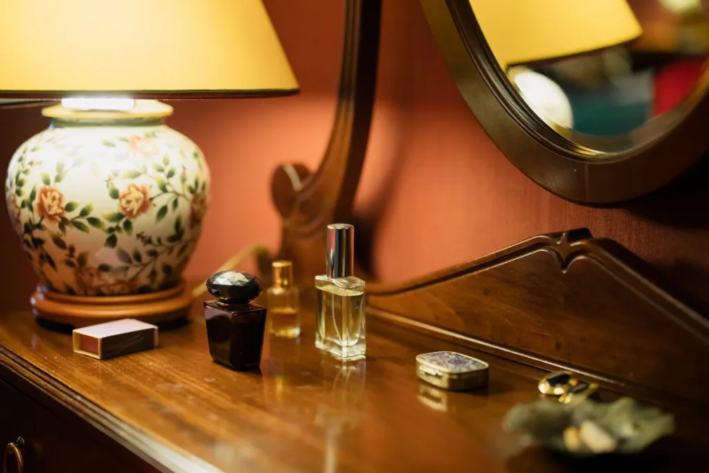 Perfume bottles on a vintage dressing table